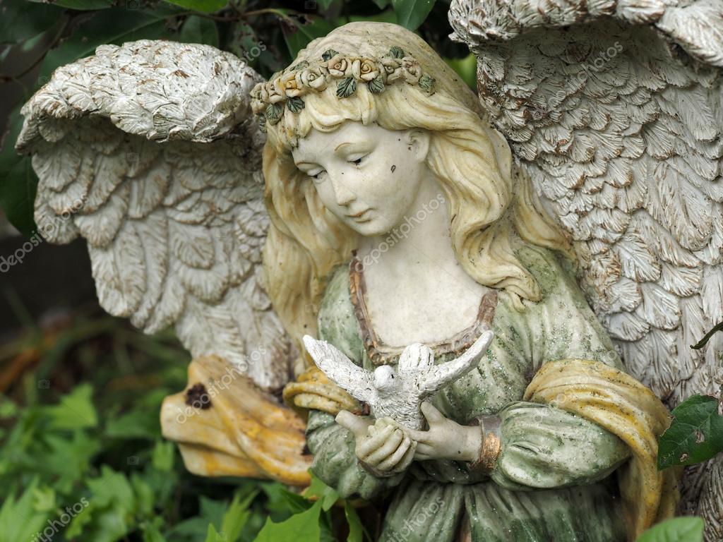 Angel with bird nest concrete statue