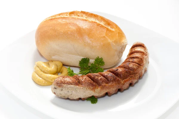 Izgara sosis - Bratwurst hardal, ekmek ve maydanoz ile — Stok fotoğraf