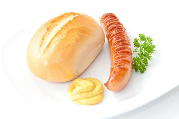 Saucisse grillée - Bratwurst à la moutarde, pain et persil Image En Vente