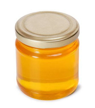 Beyaz arka planda izole edilmiş bal dolu cam kavanoz