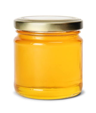 Beyaz arka planda izole edilmiş bal dolu cam kavanoz