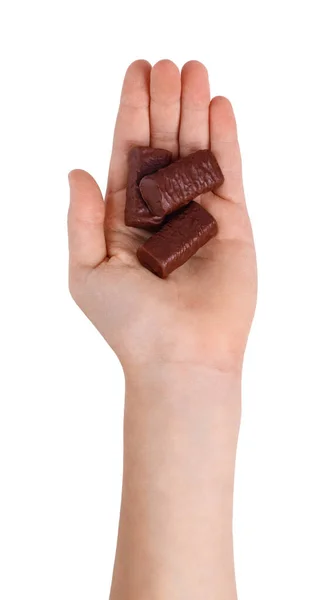 Schokoladenbonbons Der Hand Eines Jungen Isoliert Auf Weißem Hintergrund Ansicht — Stockfoto