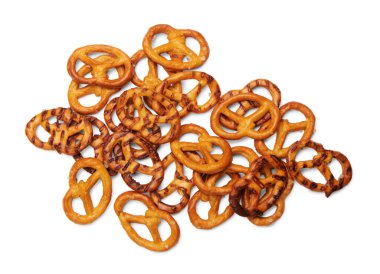 Top view of pile of salty cookies isolated on white background.