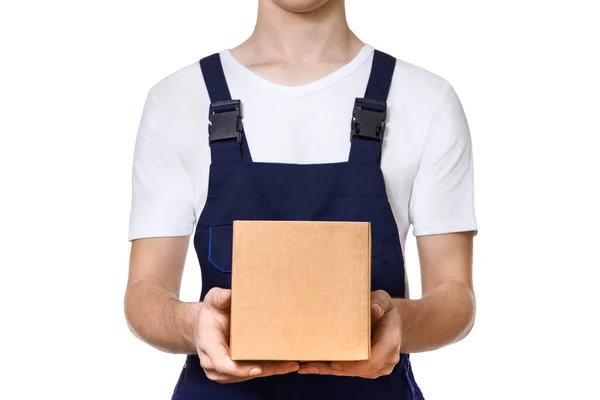 Jovem Macacão Azul Escuro Uma Camiseta Branca Segurando Caixa Papelão — Fotografia de Stock