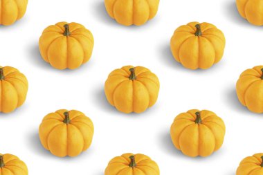 Beyaz arka planda turuncu balkabaklarıyla kusursuz tekrarlanan desen, 3 boyutlu görüntüleme. En az sebze arkaplanı.