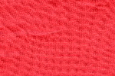 Giysiler için kırmızı kumaş dokusu.