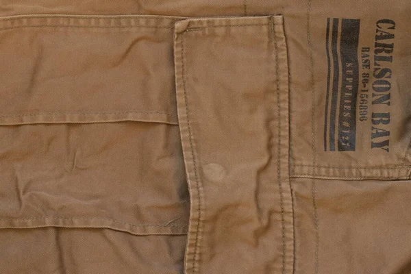 Textur Aus Stoff Mit Einer Tasche Für Kleidung — Stockfoto