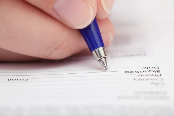 Person filling personal data — Stock Photo, Image