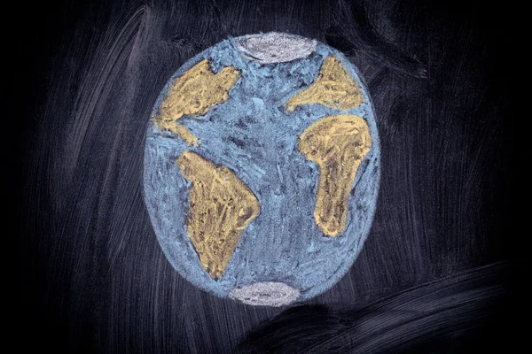 Планета Земля на фоне черной доски — стоковое фото