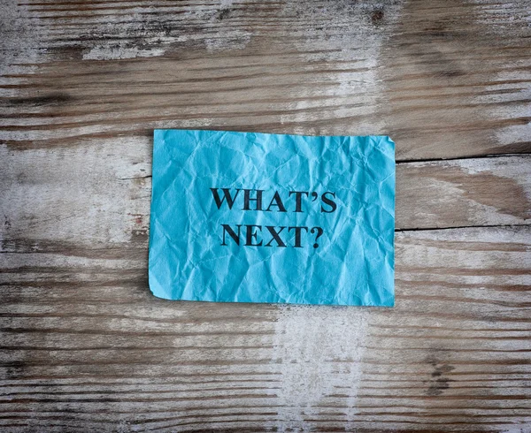 Blue paper note saying What is next? — Stock Photo, Image