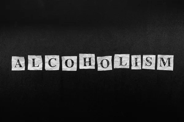 Notas de papel con la palabra Alcoholismo —  Fotos de Stock