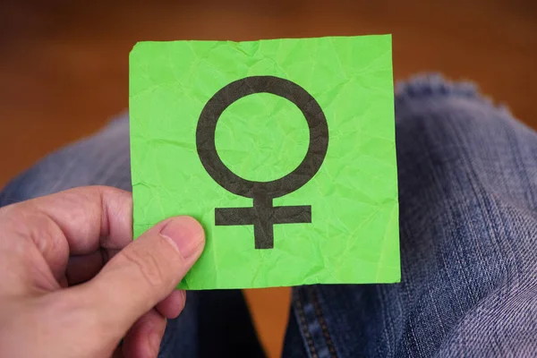Man Holding Green Paper Note Female Gender Symbol His Hand — Stock Photo, Image