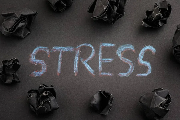 Word Stress Some Black Crumpled Paper Balls Close — Stock Photo, Image