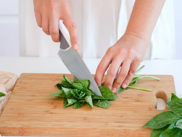 Woman Cutting Basil Leaves Knife Kitchen Close — Stock Photo, Image