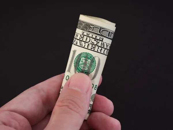 Man Holding Folded One Hundred Dollar Bill His Hand Low — Stock Photo, Image