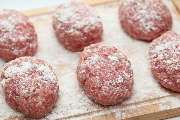 Raw pork patties — Stock Photo, Image