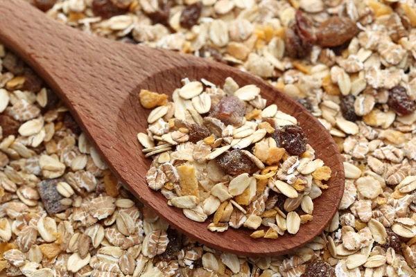 Muesli in a wooden spoon — Stock Photo, Image