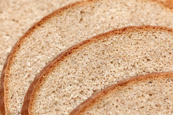 Black rye bread slices — Stock Photo, Image