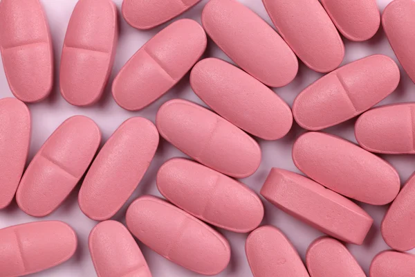 Pink pills — Stock Photo, Image