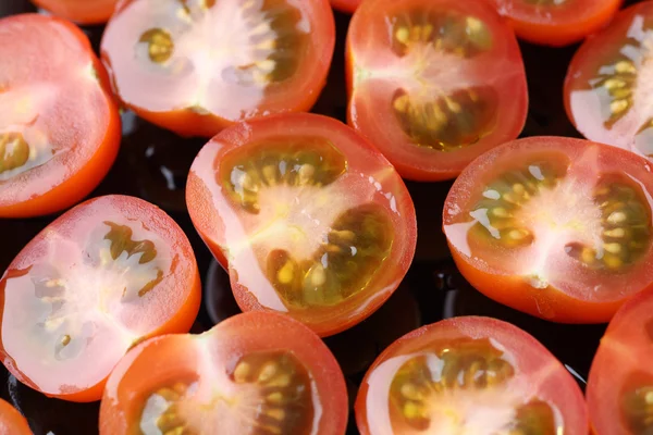Sliced cherry tomatoes — Stock Photo, Image