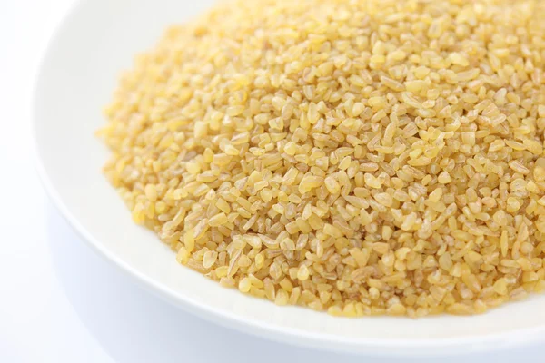 Bulgur vete i en tallrik — Stockfoto