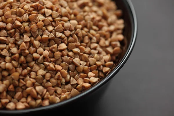 Buckwheat in a bowl — Stock Photo, Image