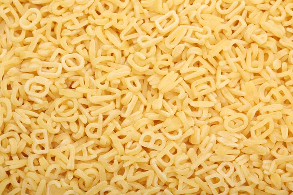 RAW alfabetet soppa pasta — Stockfoto