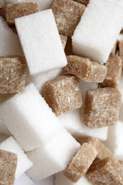 White and brown sugar cubes — Stock Photo, Image