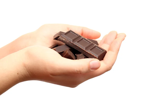 Chocolate in palms — Stock Photo, Image