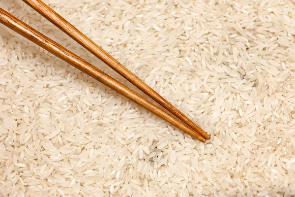 Rice and chopsticks — Stock Photo, Image