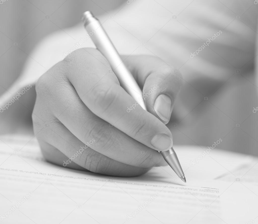 Businesswoman signing contract (Black and White)