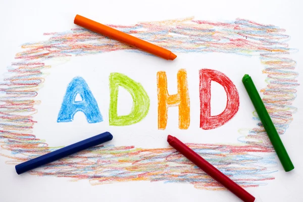 ADHD escrito na folha de papel — Fotografia de Stock