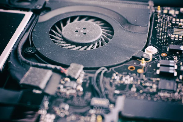 Laptop fan with dust in it and system board — Stock Photo, Image