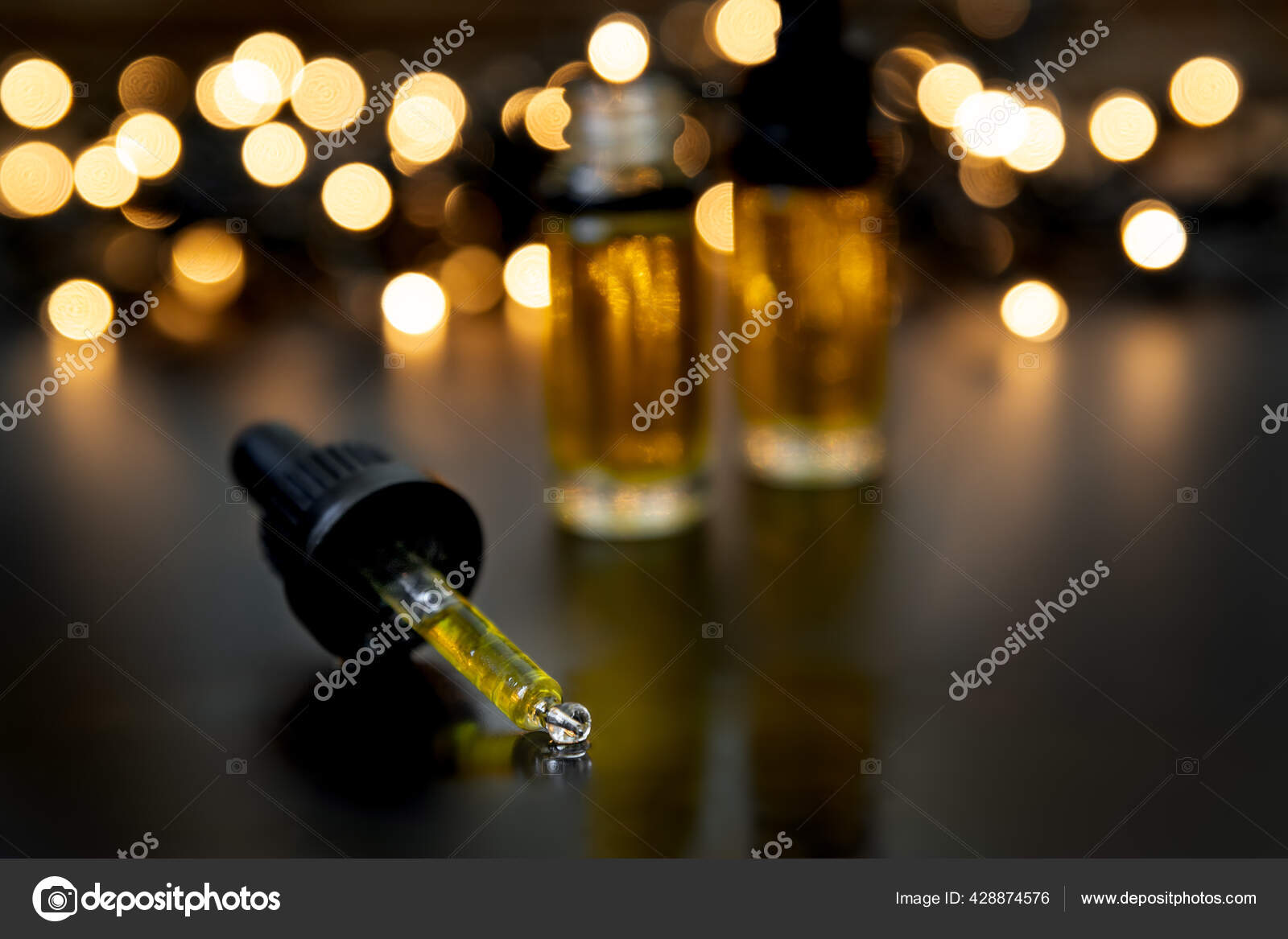 Cbd Oil Drops Moody Dark Background Dim Lighting Stock Photo by ©dianarui  428874576