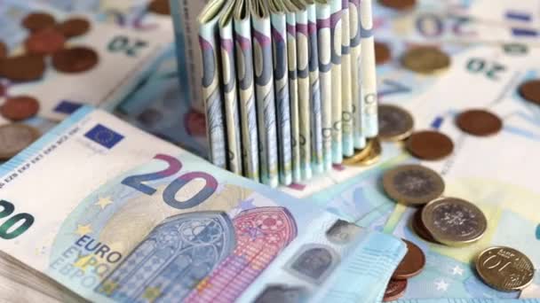 Pieniądze euro, banknoty i monety pancerne, waluta Unii Europejskiej (EUR) — Wideo stockowe