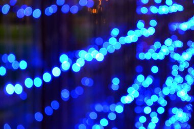 Soyut arkaplan şenliği bulanık mavi ışıklar çelengi