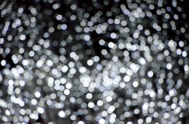 Soyut arka plan şenlik bulanık ışıklar gece şehrinde çelenk