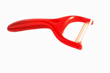 Beyaz arkaplanda kırmızı seramik soyucu izole edildi