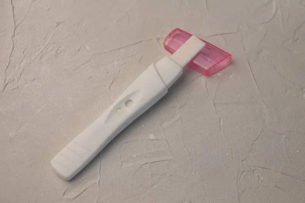 White Pregnancy Test Pink Cover Removed Gray Concrete Background Close — Stock Photo, Image