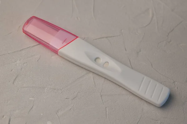 White Pregnancy Test Pink Cover Grey Concrete Background Close — Stock Photo, Image