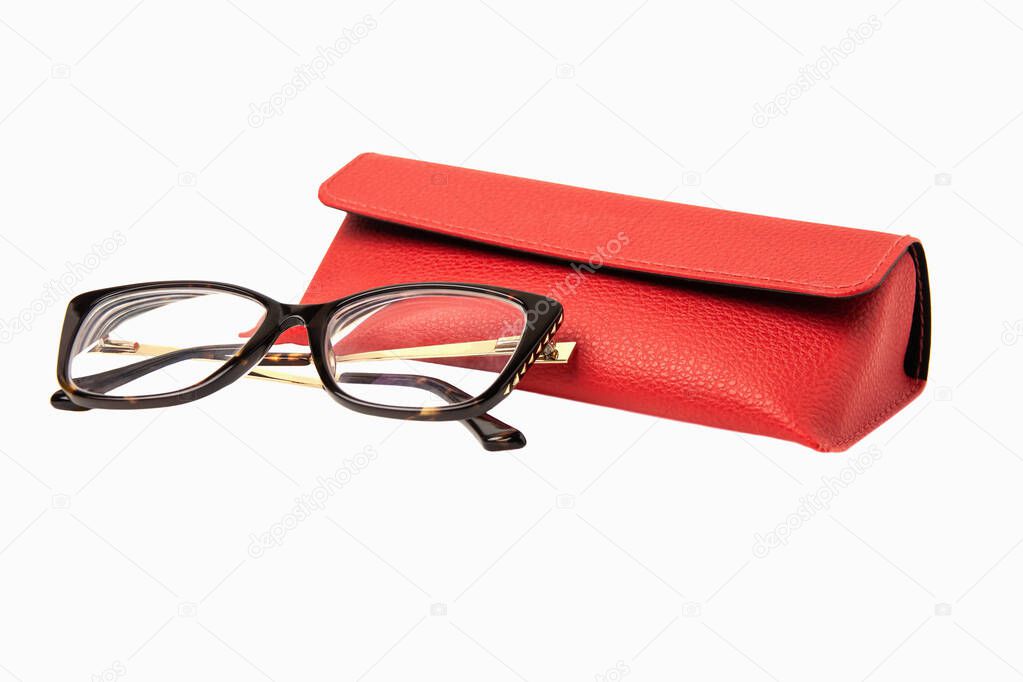 Rectangular plastic oversized eyeglasses with red glasses leather case isolated on white background