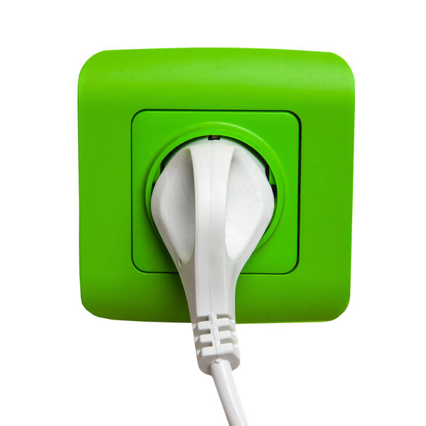 Green European socket with white plug isolated on white background. Modern design concept