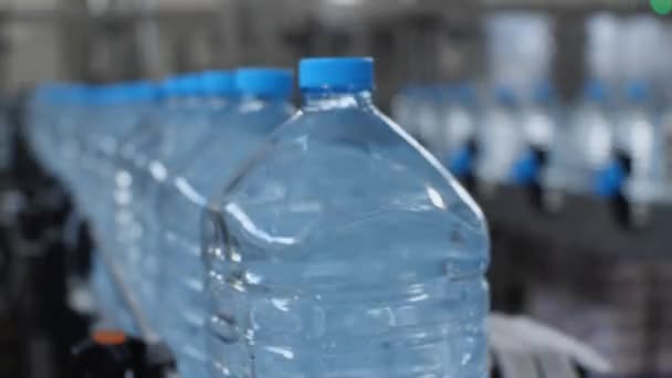 Close Five Liter Bottles Traveling Conveyor Belt Camera Production Drinking — Stock Video