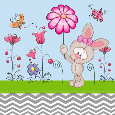 Bir çiçek ile sevimli tavşan