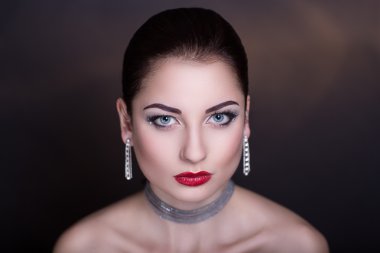 Woman with silver accessory