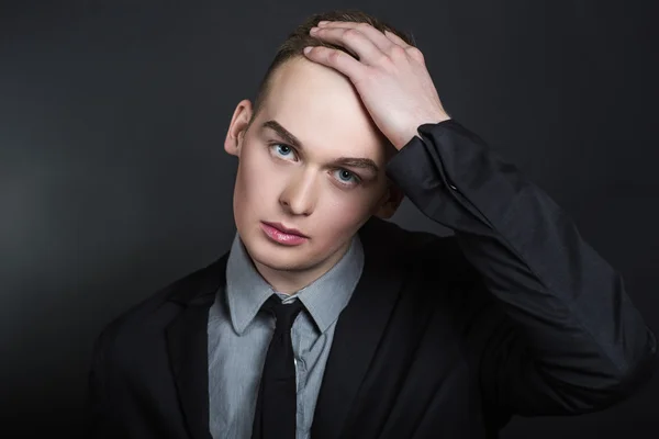 Bold man holds — Stock Photo, Image