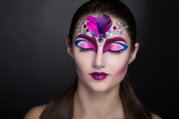 Жінка з мистецтвом макіяж — стокове фото
