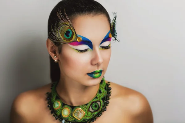 Maquillaje plumas de pavo real —  Fotos de Stock