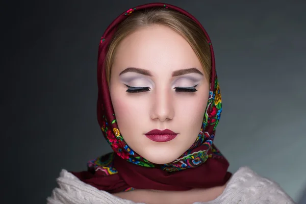 Woman in a scarf — Stock Photo, Image