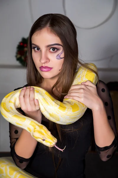 Beautiful woman with python — Stock Photo © OlgaOsa #111808064
